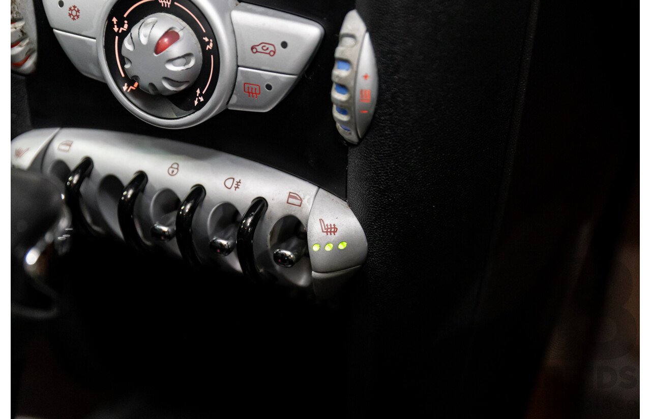 9/2009 Mini Cooper D R56 2d Hatchback Horizon Blue Metallic/Pepper White Roof Turbo Diesel 1.6L