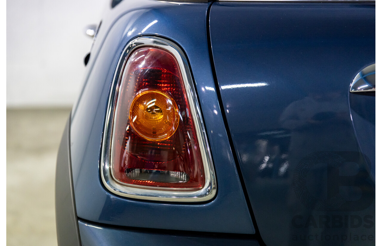 9/2009 Mini Cooper D R56 2d Hatchback Horizon Blue Metallic/Pepper White Roof Turbo Diesel 1.6L