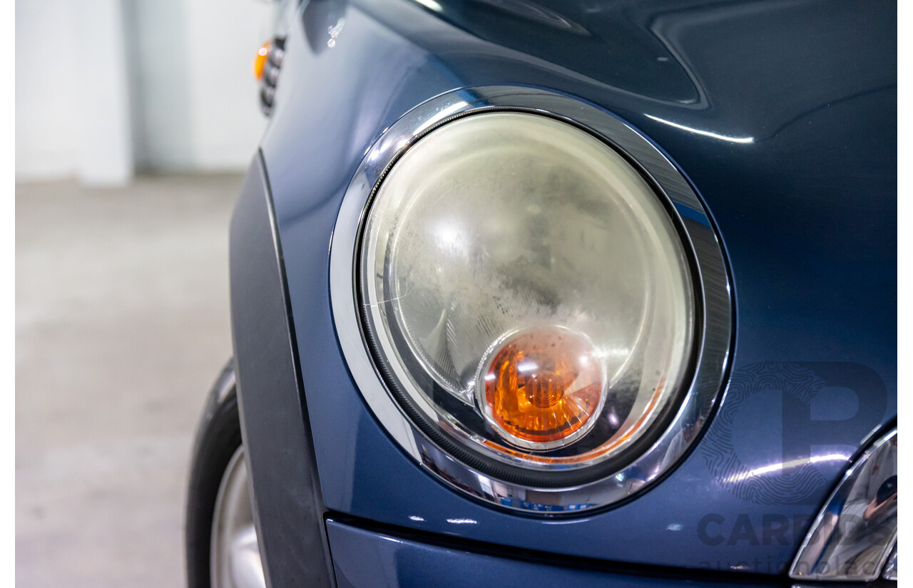 9/2009 Mini Cooper D R56 2d Hatchback Horizon Blue Metallic/Pepper White Roof Turbo Diesel 1.6L