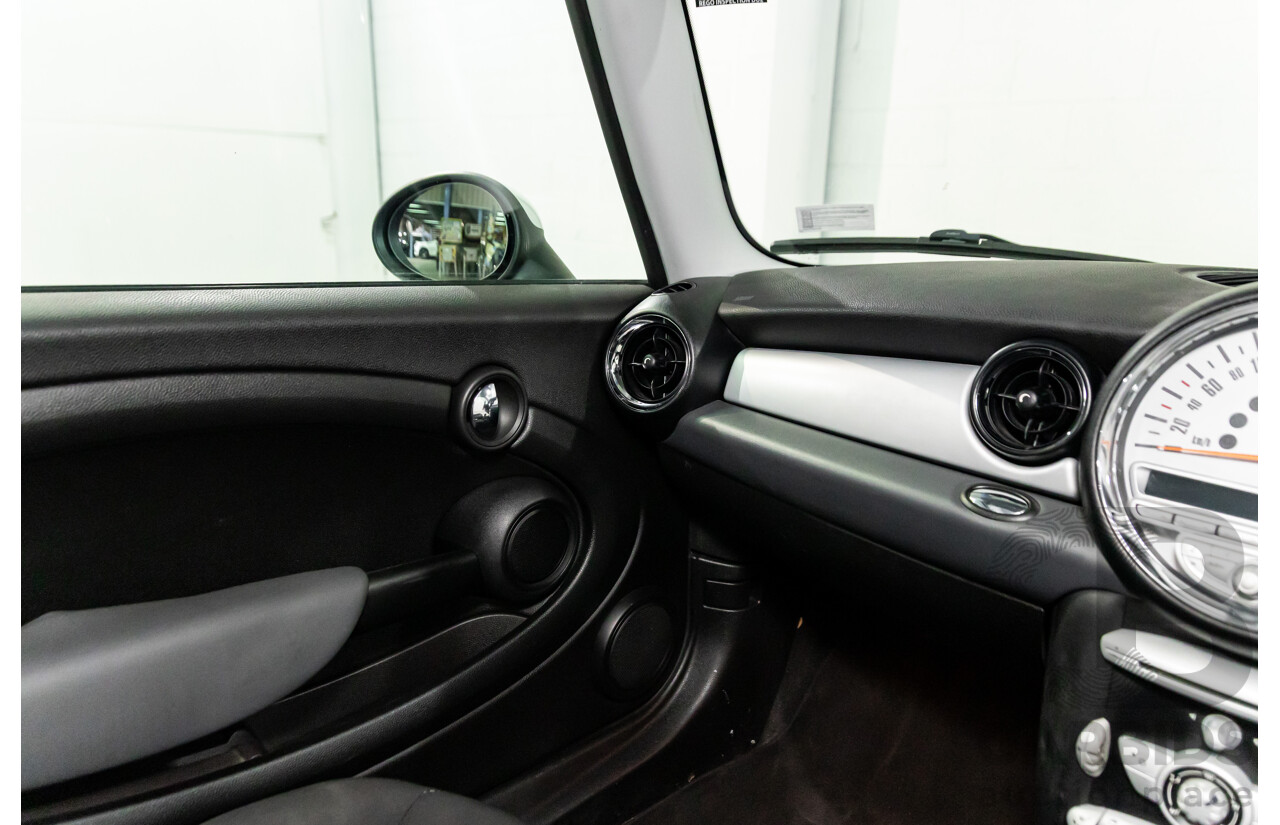 9/2009 Mini Cooper D R56 2d Hatchback Horizon Blue Metallic/Pepper White Roof Turbo Diesel 1.6L