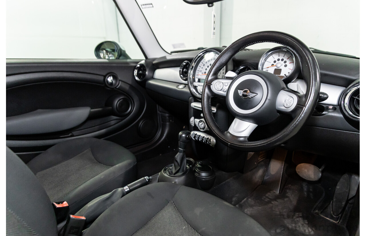 9/2009 Mini Cooper D R56 2d Hatchback Horizon Blue Metallic/Pepper White Roof Turbo Diesel 1.6L