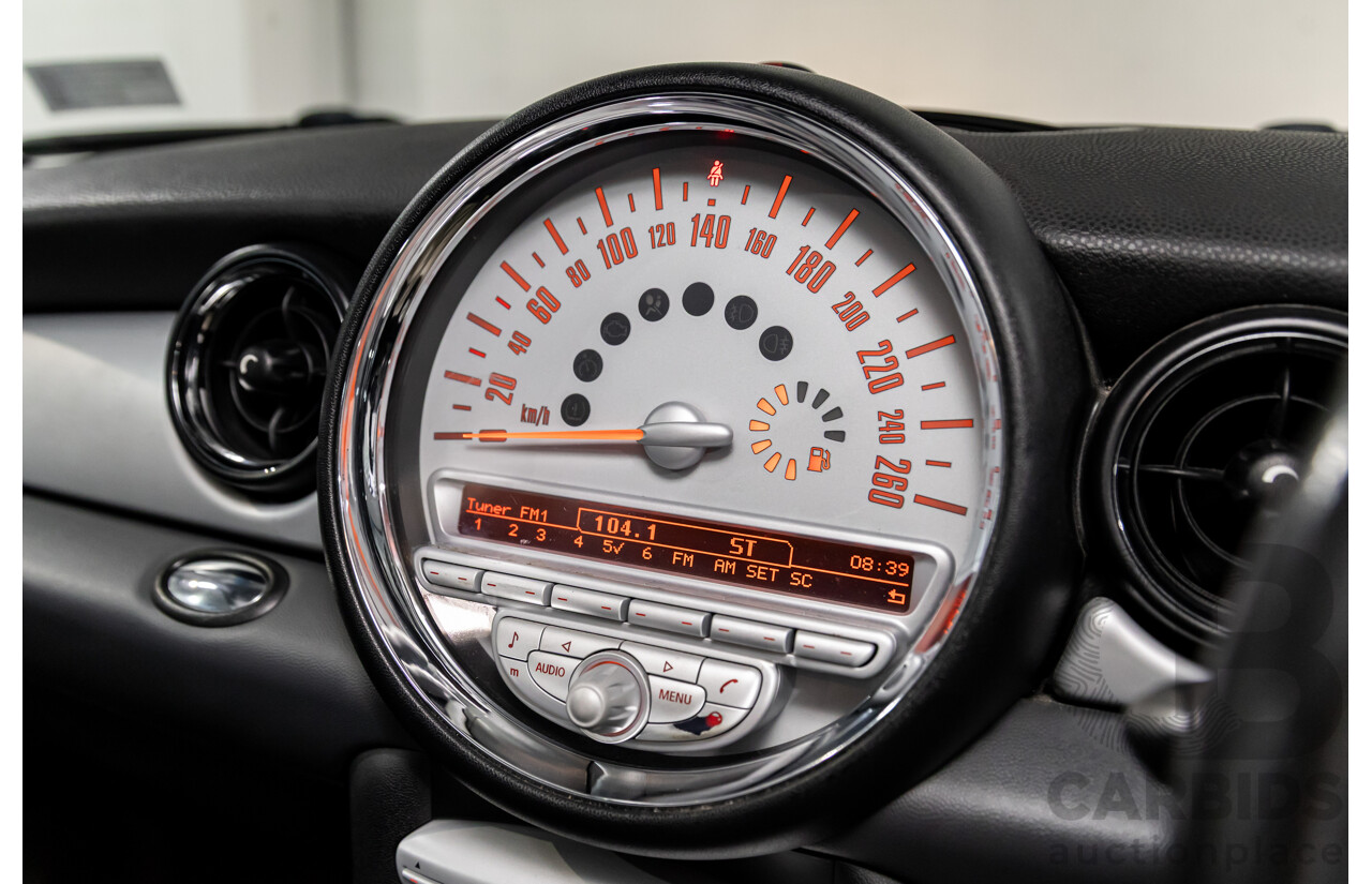 9/2009 Mini Cooper D R56 2d Hatchback Horizon Blue Metallic/Pepper White Roof Turbo Diesel 1.6L