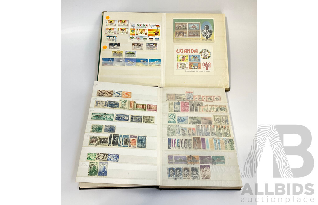 Two Albums of Antique and Vintage International Mint and Cancelled Stamps Including Zanzibar Nigeria, Guernsey, Zimbabwe, Zaire, Uruguay, Paraguay, Mexico, Brazil, Guyana, Colombia and More