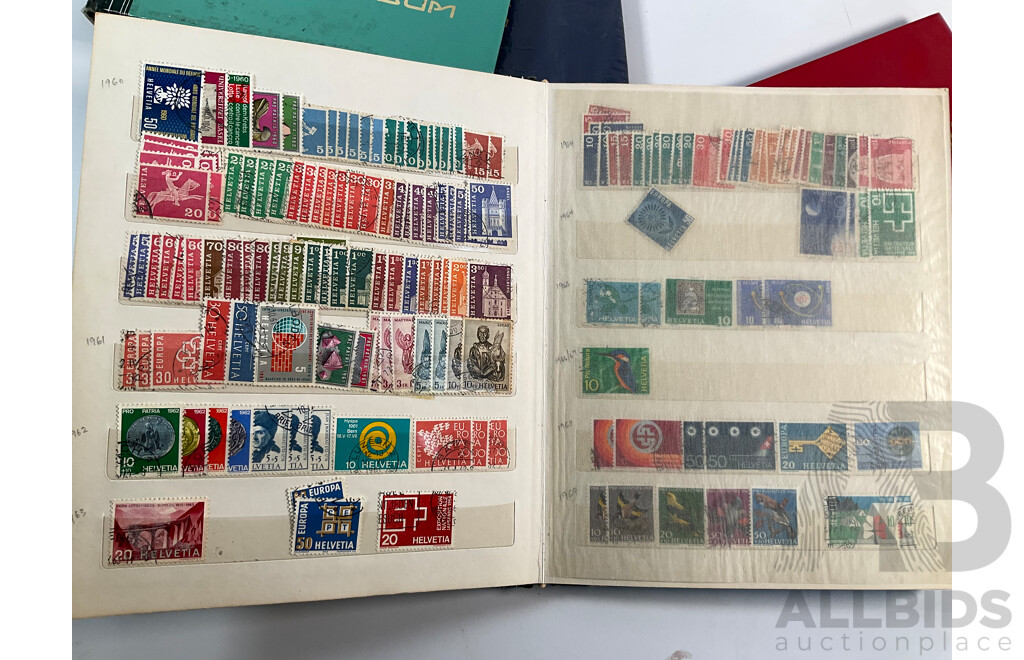 Four Albums of International Mint and Cancelled Stamps Including Switzerland Examples Spanning 1908 to 1980's, Gibraltar, St Vincent, Vietnam, Poland