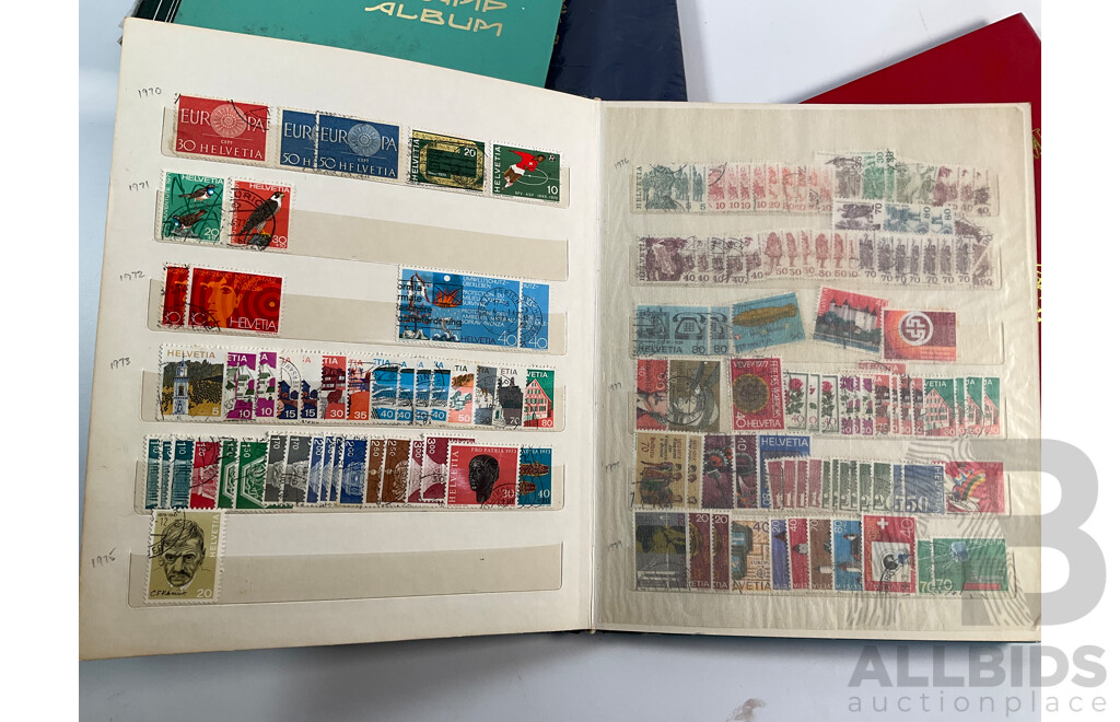 Four Albums of International Mint and Cancelled Stamps Including Switzerland Examples Spanning 1908 to 1980's, Gibraltar, St Vincent, Vietnam, Poland