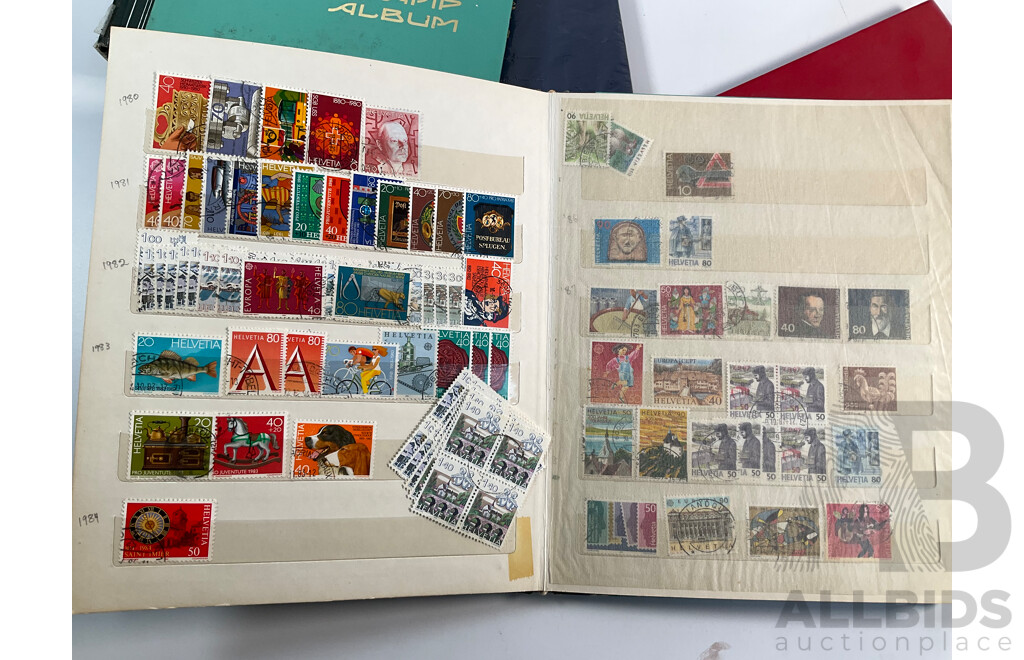Four Albums of International Mint and Cancelled Stamps Including Switzerland Examples Spanning 1908 to 1980's, Gibraltar, St Vincent, Vietnam, Poland