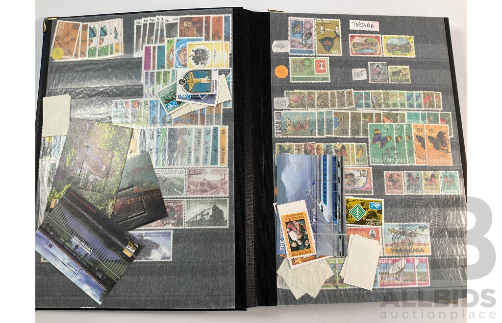 Albums of Commonwealth Mint and Cancelled Stamps Including Anguilla, Falkland Islands, Cayman Islands, Cyprus, Dominica, Kenya, Zambia, Uganda, Solomon Islands, Jamaica, Tanzania, Grenada