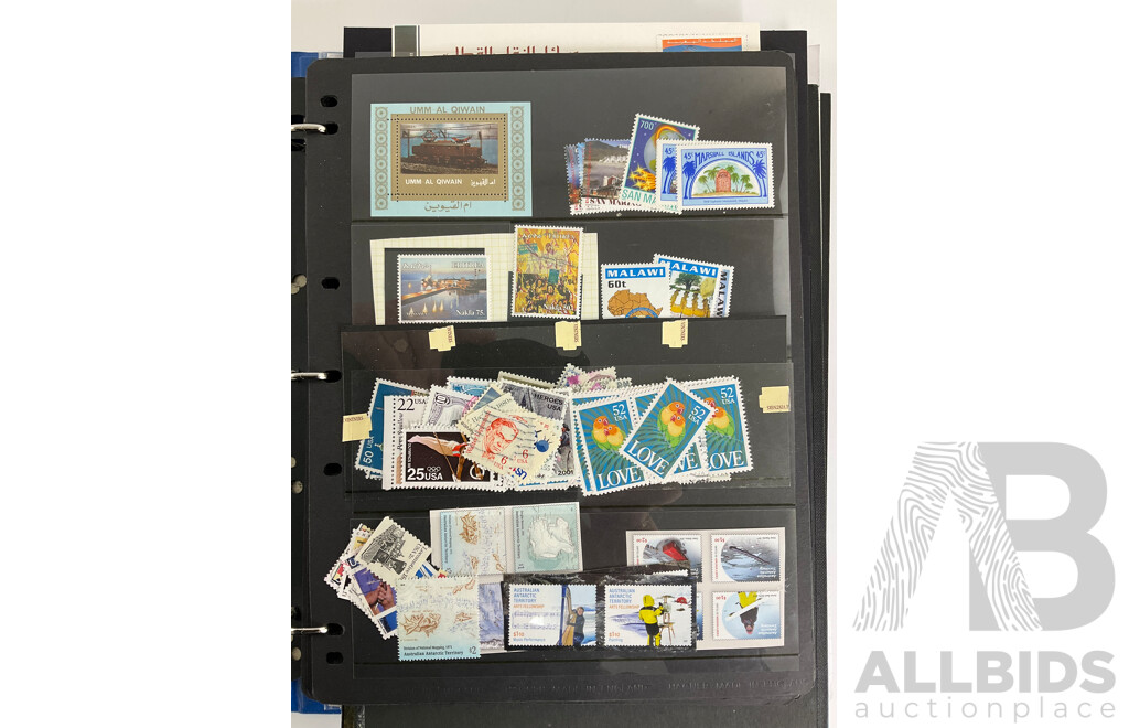 Album of International Stamps Including Australia, USA, UK, Maldives, Pakistan, Malta, Mints