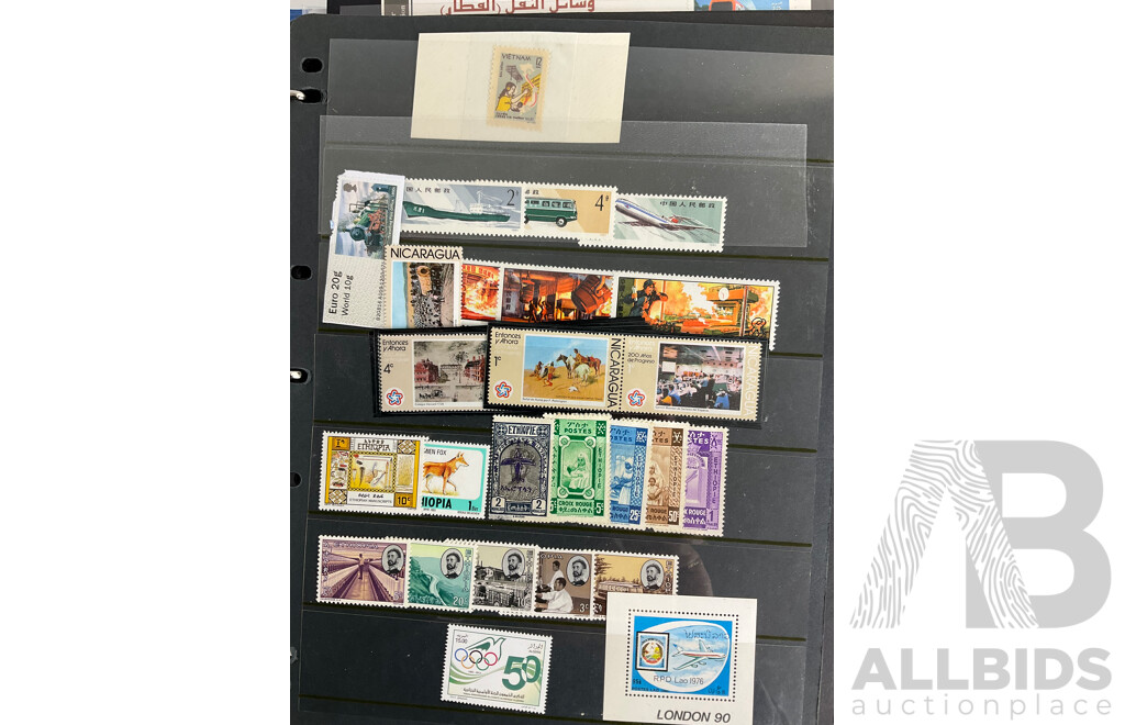 Album of International Stamps Including Australia, USA, UK, Maldives, Pakistan, Malta, Mints