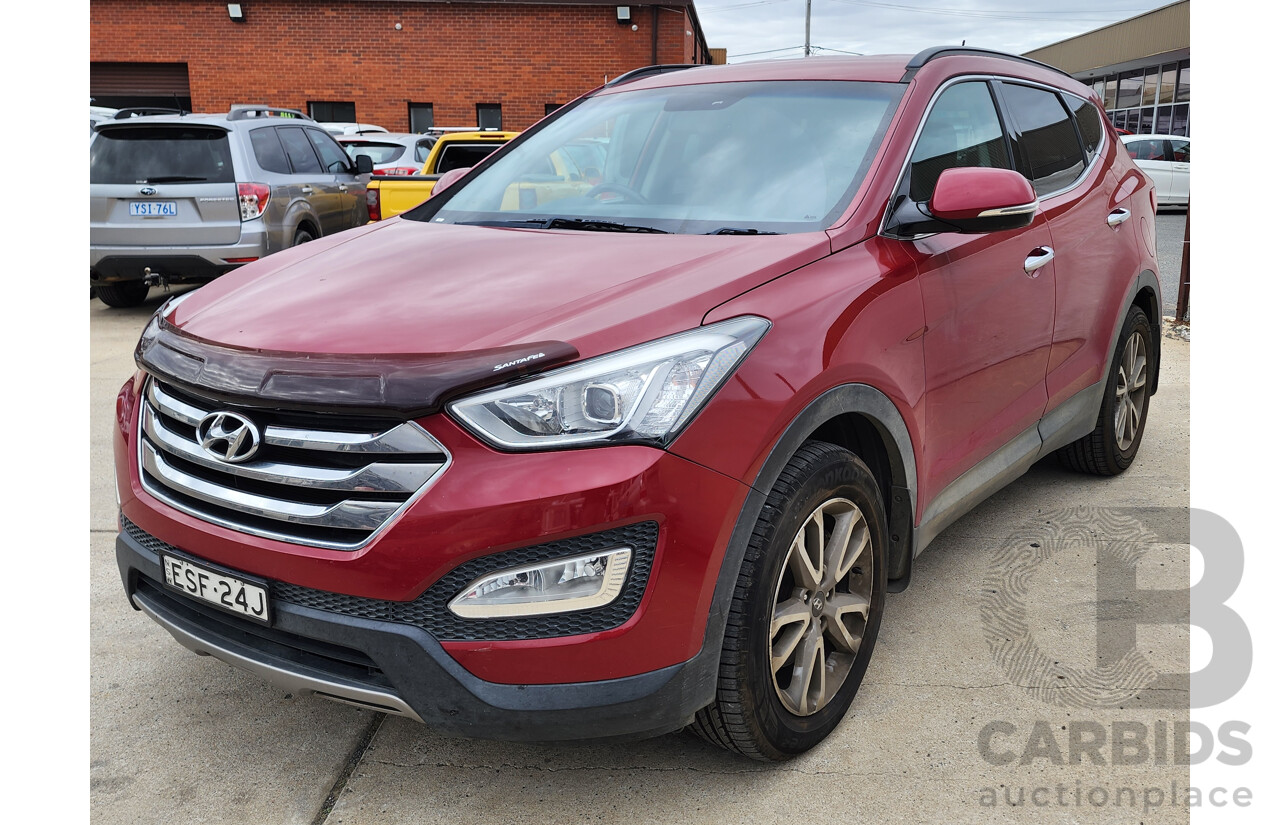 8/2014 Hyundai Santa Fe Elite CRDi (4x4) DM MY15 4d Wagon Red 2.2L