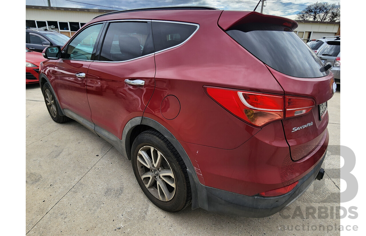 8/2014 Hyundai Santa Fe Elite CRDi (4x4) DM MY15 4d Wagon Red 2.2L