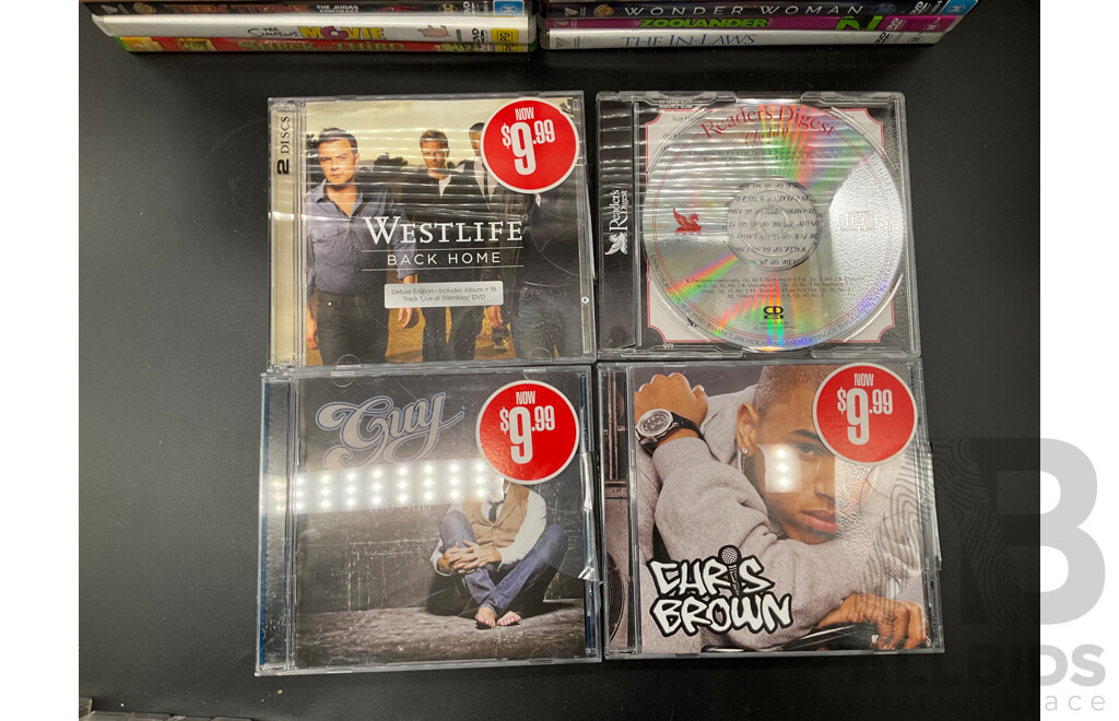 Assorted DVDs, CDs  and Cassettes