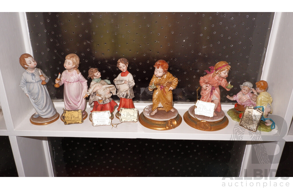 Collection of 7 Capo Dimonte Porcelain Figurines