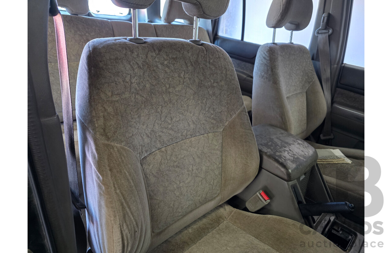 6/1999 Nissan Patrol ST (4x4) GU 4d Wagon Green 2.8L - 7 Seats