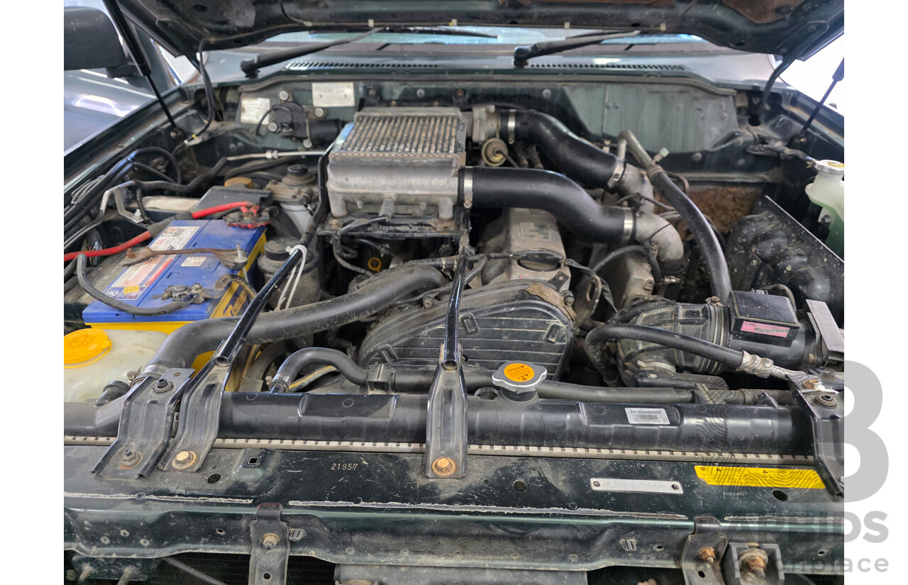 6/1999 Nissan Patrol ST (4x4) GU 4d Wagon Green 2.8L - 7 Seats