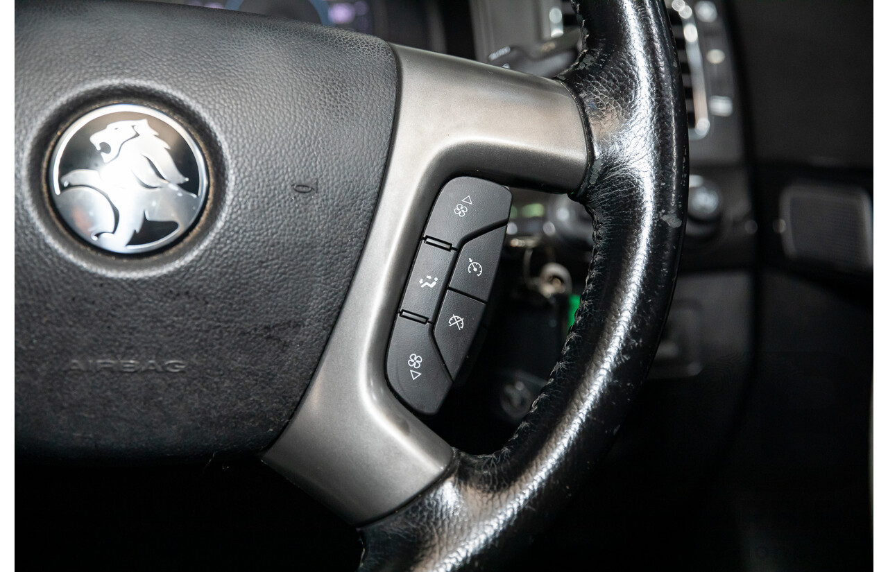 11/2013 Holden Captiva 7 LX (AWD) CG MY13 4d Wagon Carbon Flash Metallic V6 3.0L - 7 Seater