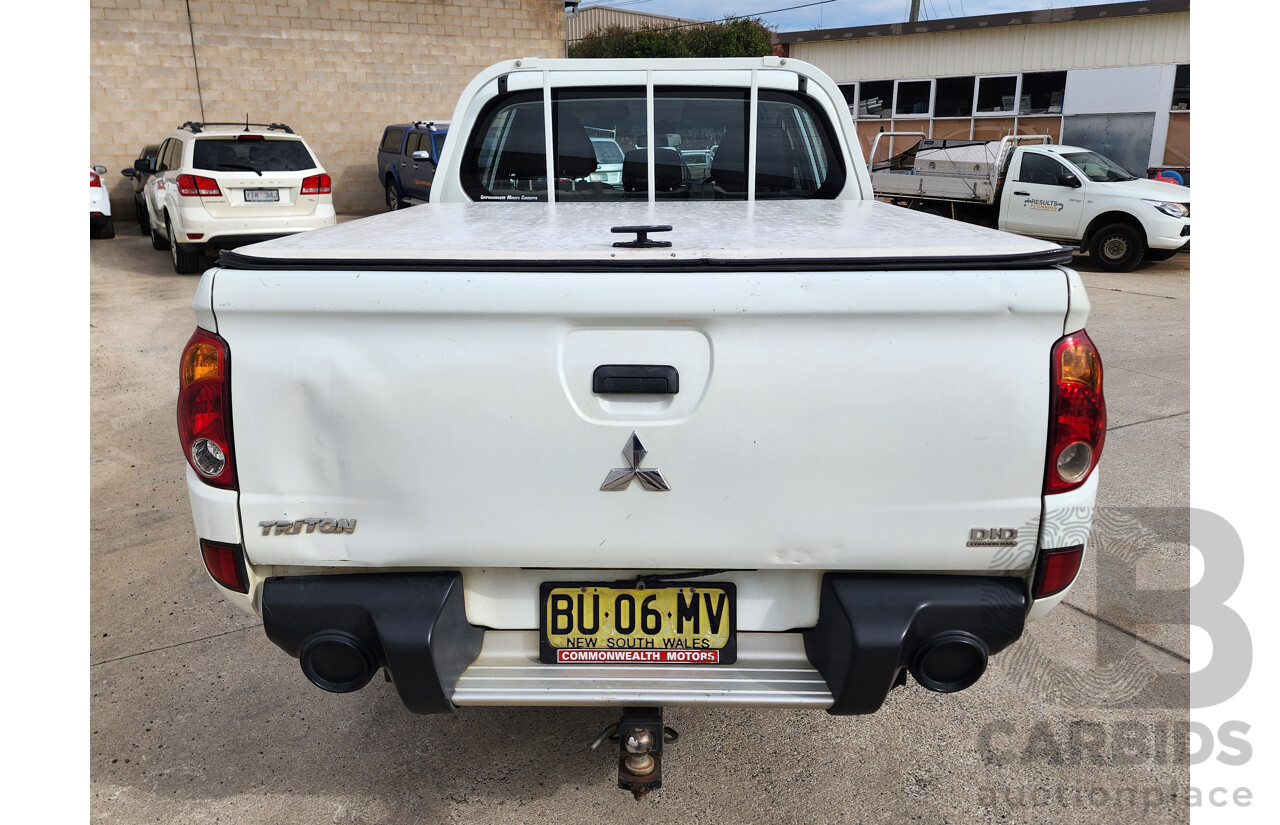 6/2013 Mitsubishi Triton GLX (4x4) MN MY13 Double Cab Utility White 2.5L