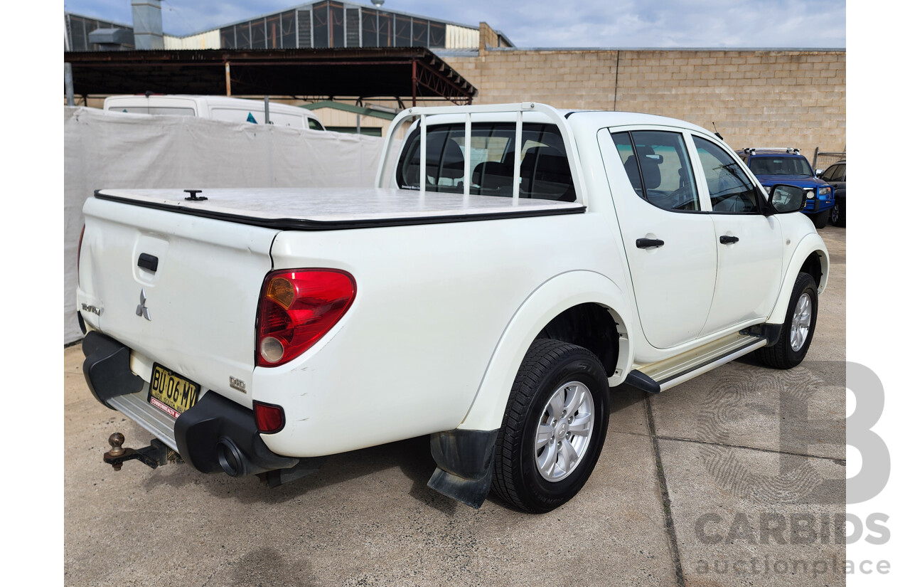 6/2013 Mitsubishi Triton GLX (4x4) MN MY13 Double Cab Utility White 2.5L