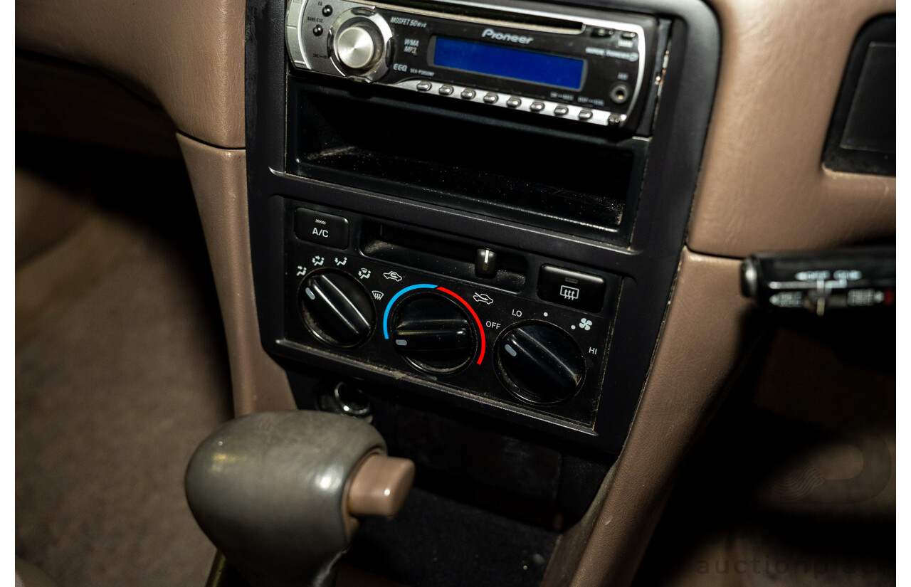 9/1999 Toyota Camry CSi SXV20R 4d Sedan Parchment Metallic 2.2L