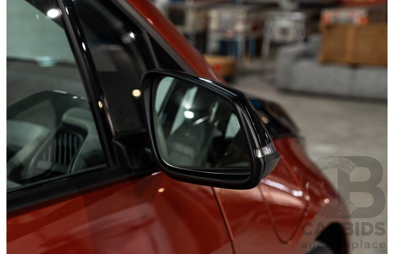 05/2015 BMW i3 REx Hybrid (RWD) IO1 4d Hatchback Solar Orange Metallic/Fluid Black 0.6L - 125kW