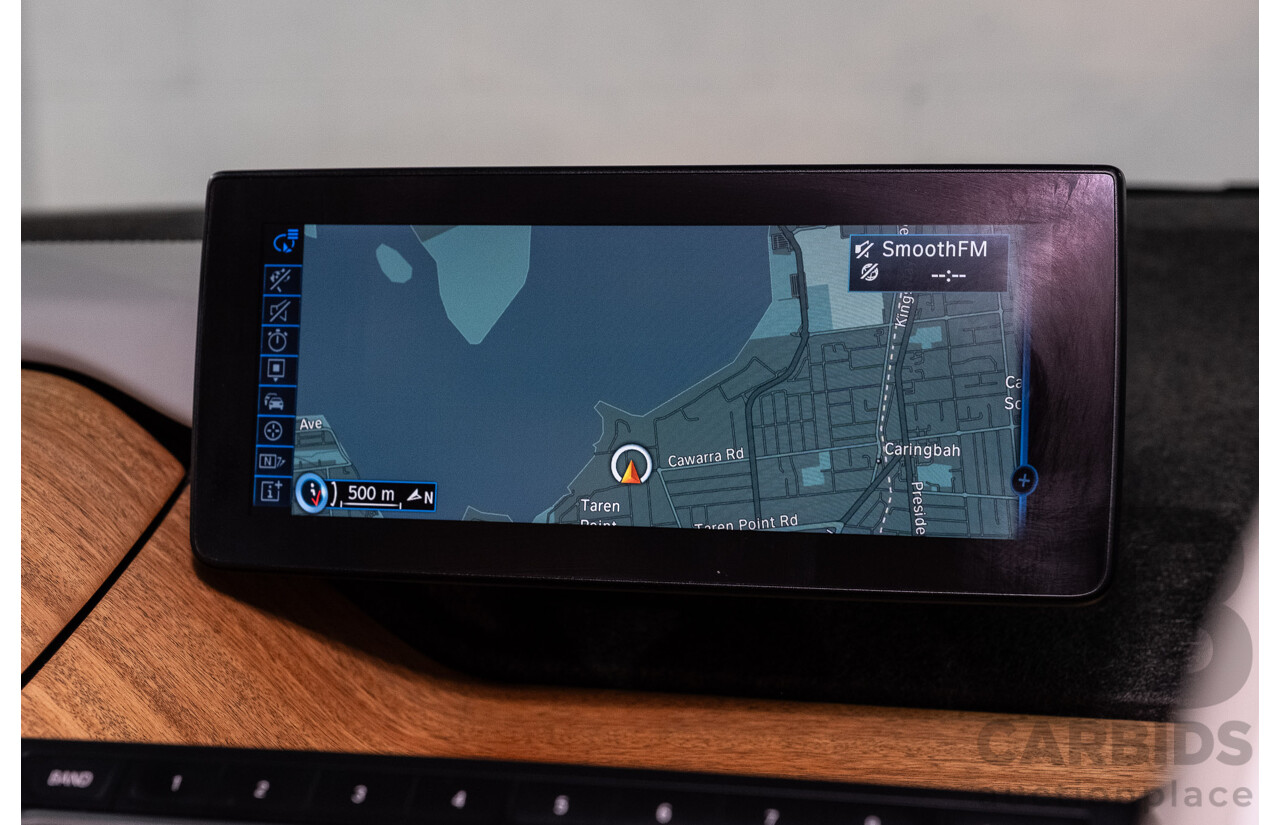 05/2015 BMW i3 REx Hybrid (RWD) IO1 4d Hatchback Solar Orange Metallic/Fluid Black 0.6L - 125kW