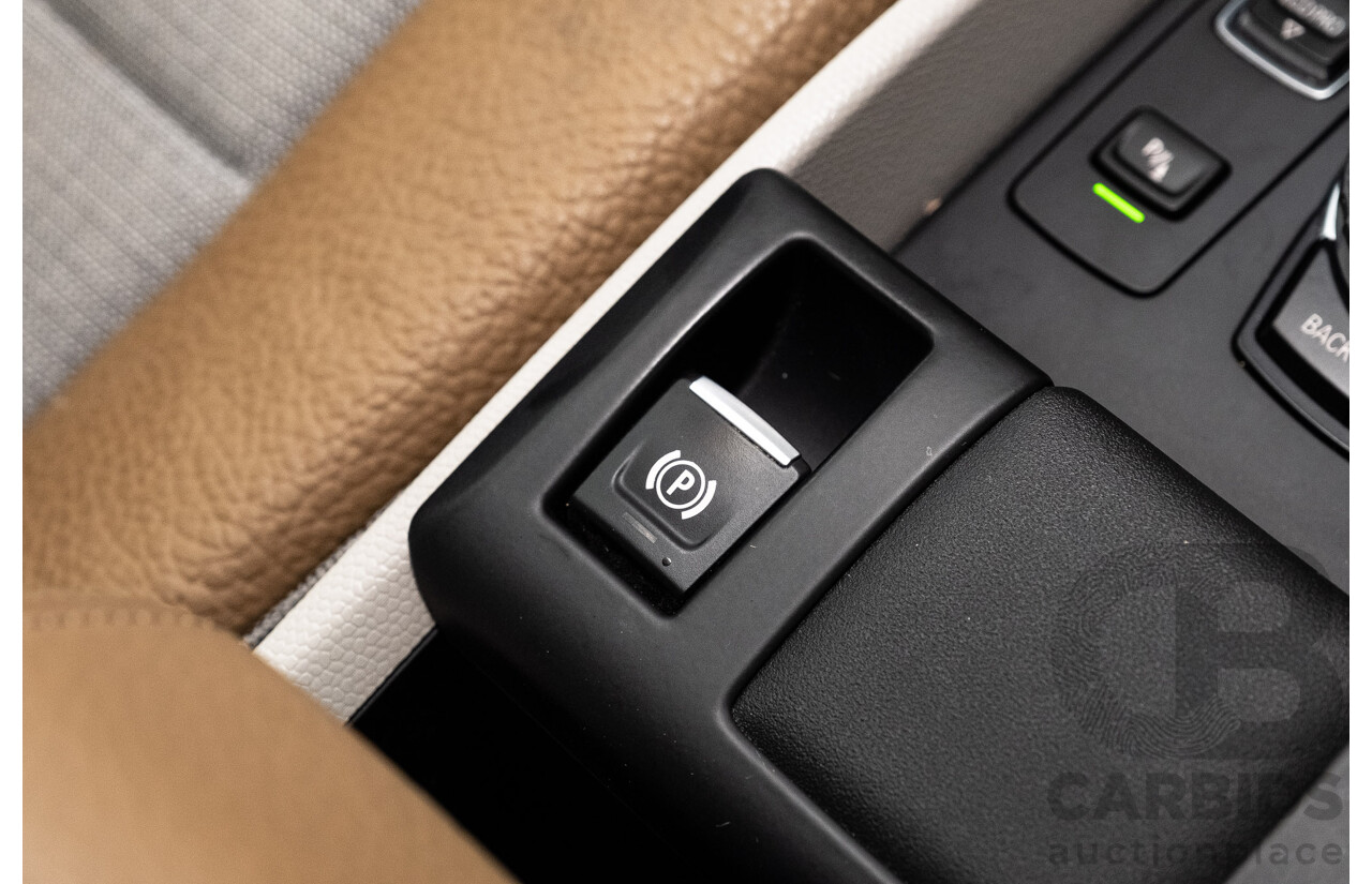 05/2015 BMW i3 REx Hybrid (RWD) IO1 4d Hatchback Solar Orange Metallic/Fluid Black 0.6L - 125kW