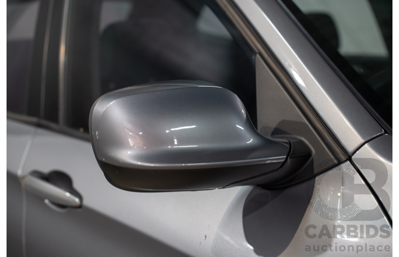 8/2011 BMW X1 Sdrive 18i (RWD) E84 MY11.5 4d Wagon Space Grey Metallic 2.0L