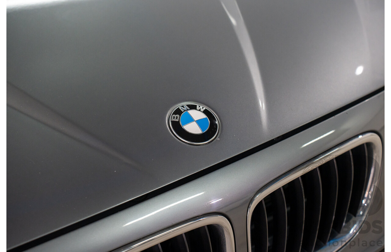 8/2011 BMW X1 Sdrive 18i (RWD) E84 MY11.5 4d Wagon Space Grey Metallic 2.0L