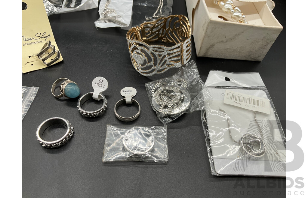Assorted Costume Jewellery,  Phone Charm Strap, Stainless Steel Rings and Sterling Silver Bracelets - Lot of 23