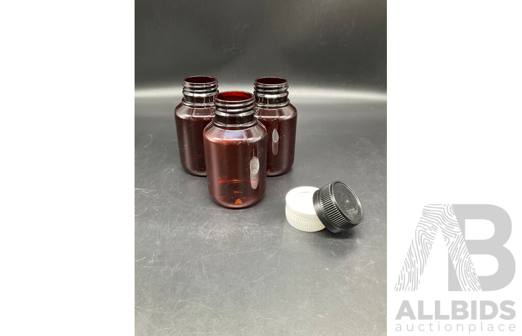 Large Bag Filled with Amber Plastic Bottles