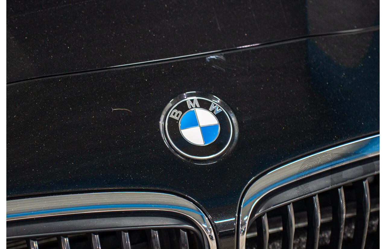 11/2014 BMW 225i Active Tourer Sport Line F45 4d Wagon Black Sapphire Metallic Turbo 2.0L