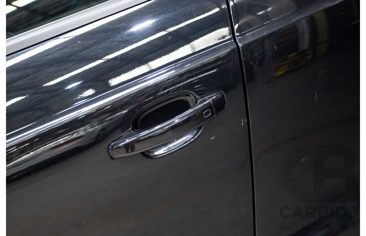 07/2014 Audi Q3 TFSI Quattro (AWD) 125kw 8U MY14 4d Wagon Phantom Black Pearl Turbo 2.0L