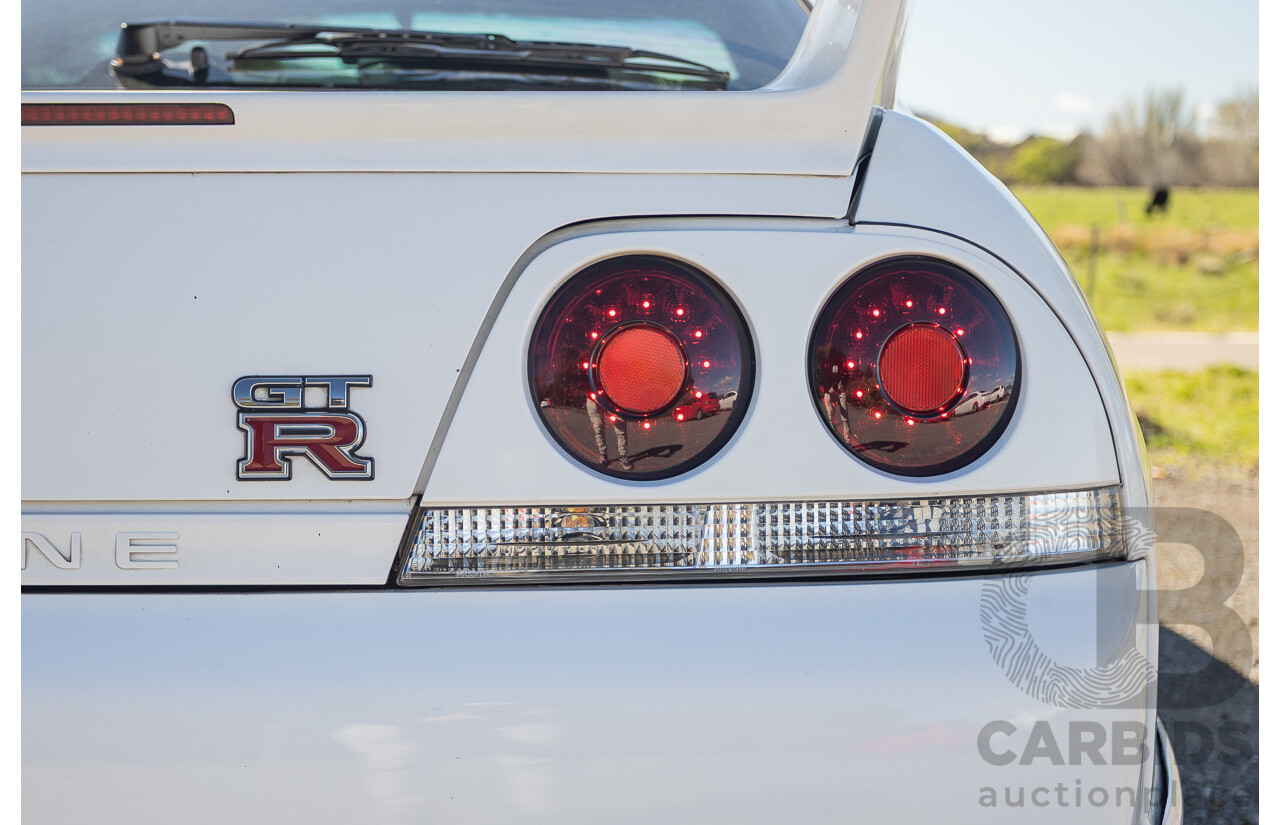 04/1997 Nissan Skyline R33 GT-R Series 3 BNR33 (AWD) 2d Coupe QM1 Polar White Turbo 2.6L - Modified 850hp+ - 05/2009 Import