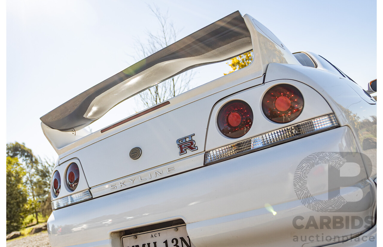 04/1997 Nissan Skyline R33 GT-R Series 3 BNR33 (AWD) 2d Coupe QM1 Polar White Turbo 2.6L - Modified 850hp+ - 05/2009 Import
