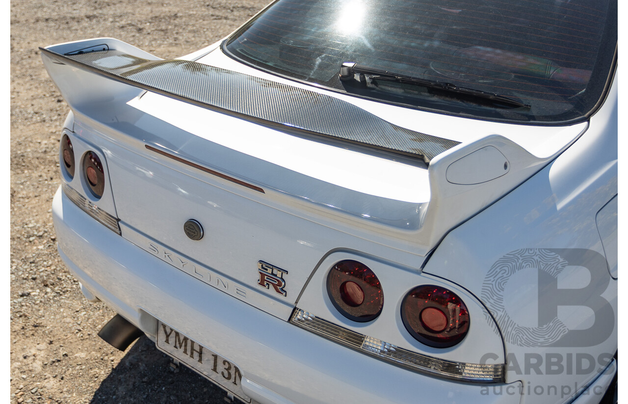 04/1997 Nissan Skyline R33 GT-R Series 3 BNR33 (AWD) 2d Coupe QM1 Polar White Turbo 2.6L - Modified 850hp+ - 05/2009 Import