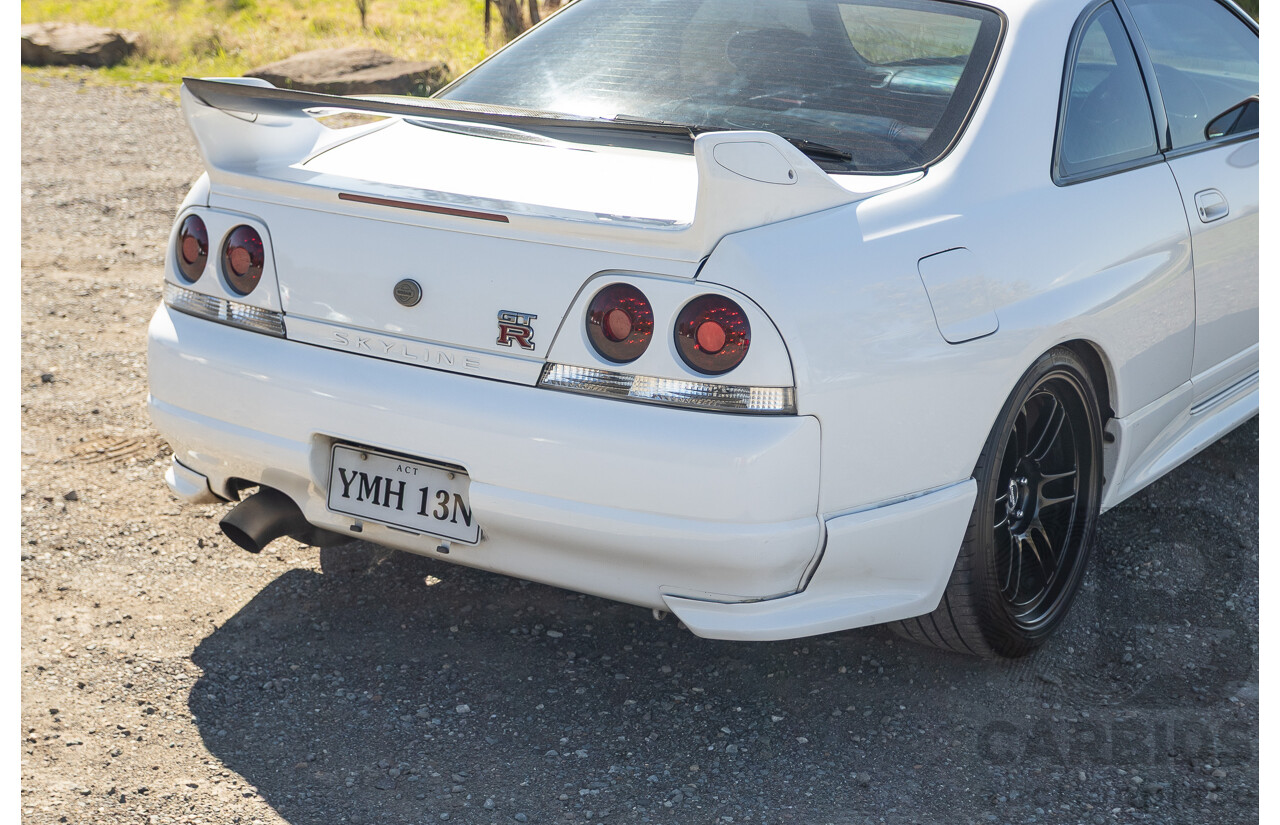 04/1997 Nissan Skyline R33 GT-R Series 3 BNR33 (AWD) 2d Coupe QM1 Polar White Turbo 2.6L - Modified 850hp+ - 05/2009 Import