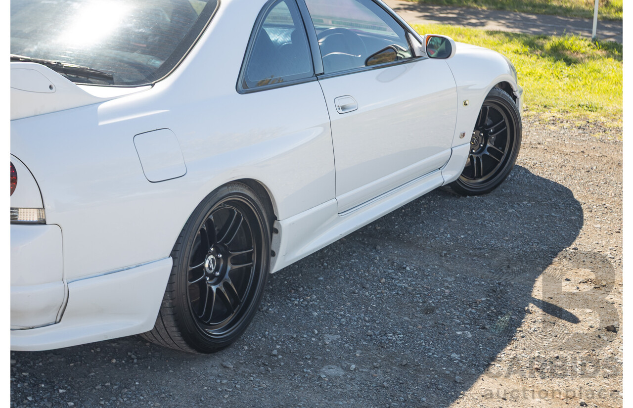 04/1997 Nissan Skyline R33 GT-R Series 3 BNR33 (AWD) 2d Coupe QM1 Polar White Turbo 2.6L - Modified 850hp+ - 05/2009 Import
