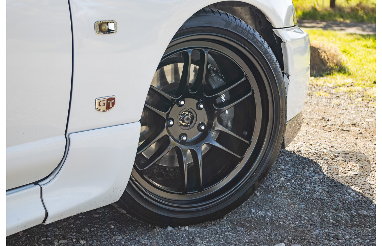04/1997 Nissan Skyline R33 GT-R Series 3 BNR33 (AWD) 2d Coupe QM1 Polar White Turbo 2.6L - Modified 850hp+ - 05/2009 Import
