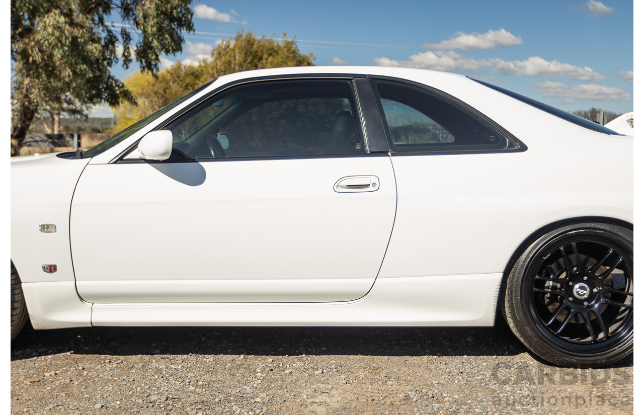 04/1997 Nissan Skyline R33 GT-R Series 3 BNR33 (AWD) 2d Coupe QM1 Polar White Turbo 2.6L - Modified 850hp+ - 05/2009 Import