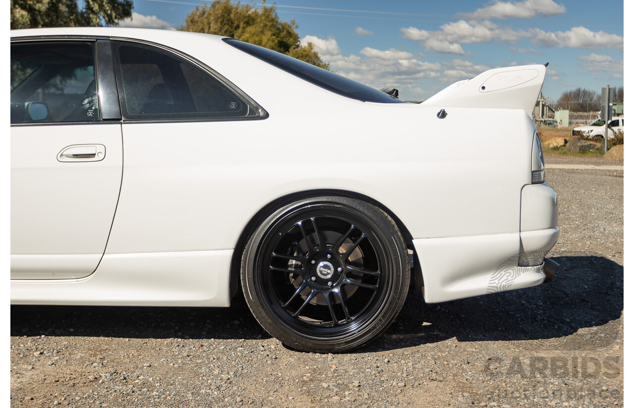04/1997 Nissan Skyline R33 GT-R Series 3 BNR33 (AWD) 2d Coupe QM1 Polar White Turbo 2.6L - Modified 850hp+ - 05/2009 Import