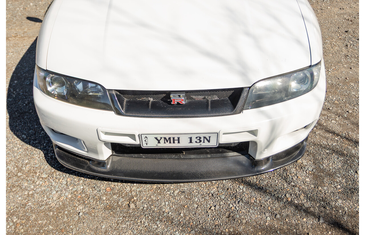 04/1997 Nissan Skyline R33 GT-R Series 3 BNR33 (AWD) 2d Coupe QM1 Polar White Turbo 2.6L - Modified 850hp+ - 05/2009 Import