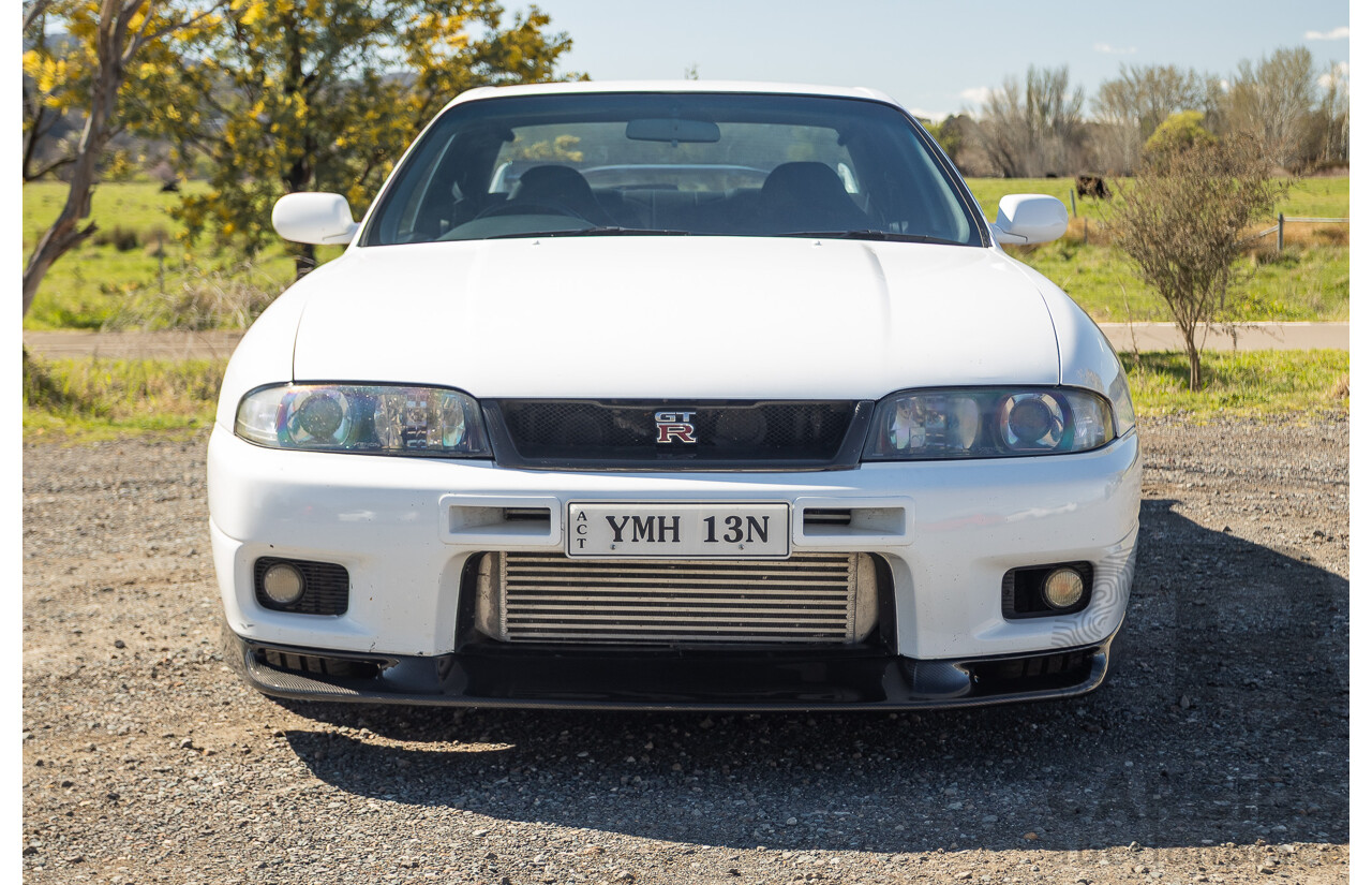 04/1997 Nissan Skyline R33 GT-R Series 3 BNR33 (AWD) 2d Coupe QM1 Polar White Turbo 2.6L - Modified 850hp+ - 05/2009 Import