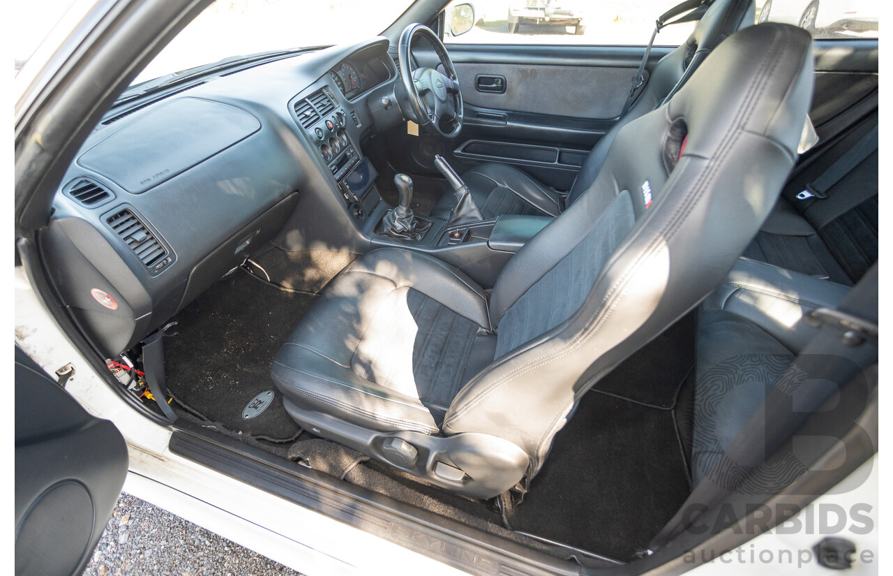 04/1997 Nissan Skyline R33 GT-R Series 3 BNR33 (AWD) 2d Coupe QM1 Polar White Turbo 2.6L - Modified 850hp+ - 05/2009 Import