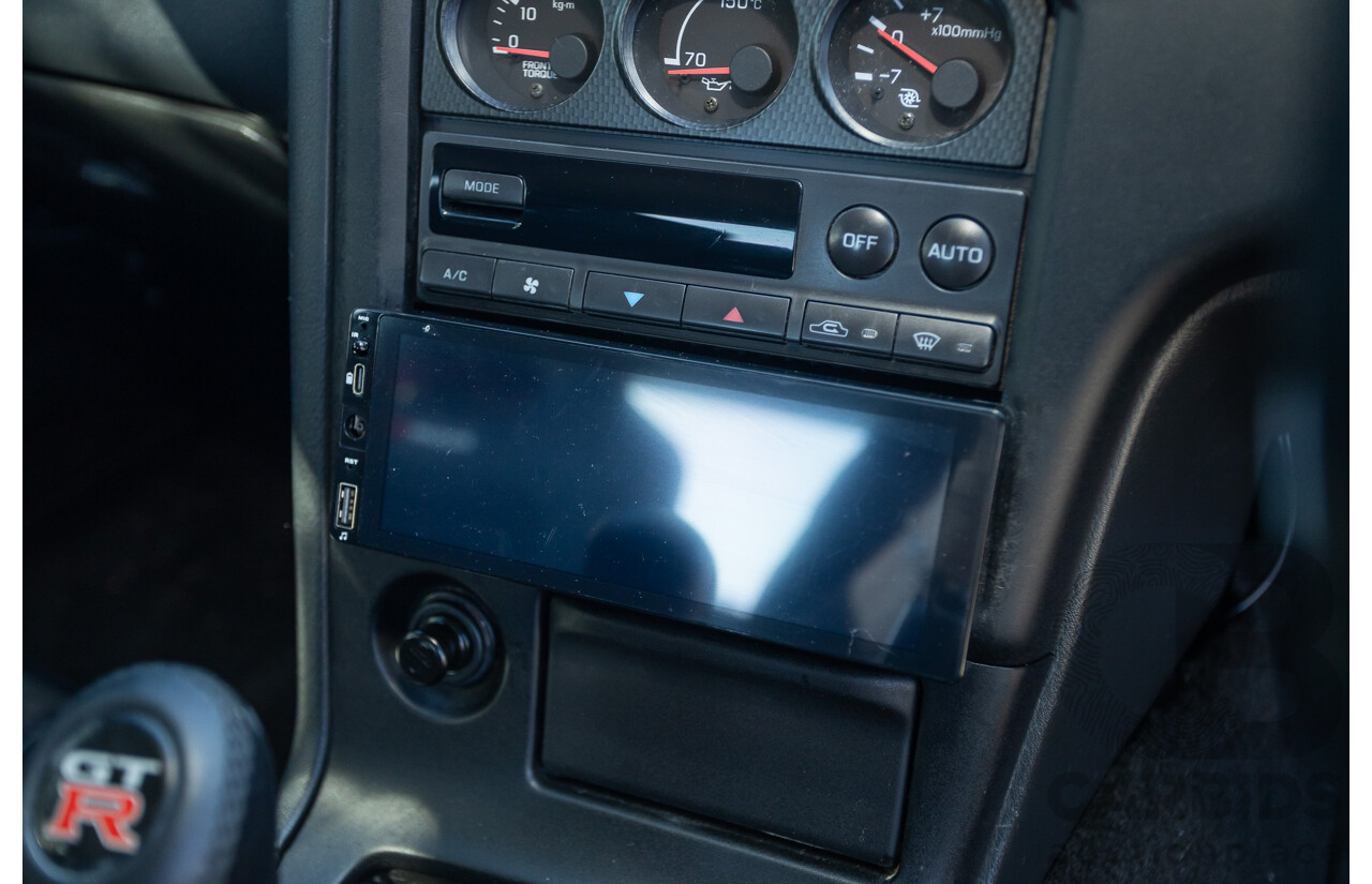 04/1997 Nissan Skyline R33 GT-R Series 3 BNR33 (AWD) 2d Coupe QM1 Polar White Turbo 2.6L - Modified 850hp+ - 05/2009 Import