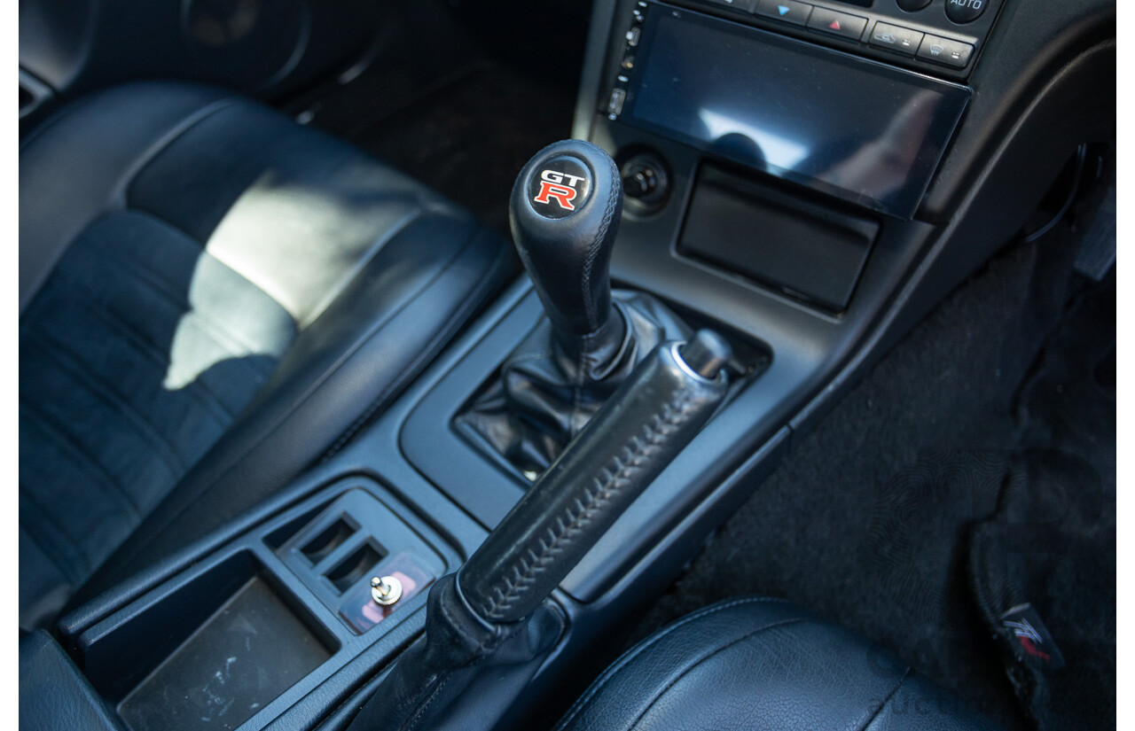 04/1997 Nissan Skyline R33 GT-R Series 3 BNR33 (AWD) 2d Coupe QM1 Polar White Turbo 2.6L - Modified 850hp+ - 05/2009 Import