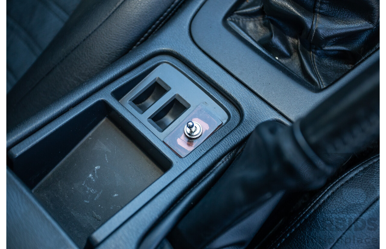 04/1997 Nissan Skyline R33 GT-R Series 3 BNR33 (AWD) 2d Coupe QM1 Polar White Turbo 2.6L - Modified 850hp+ - 05/2009 Import