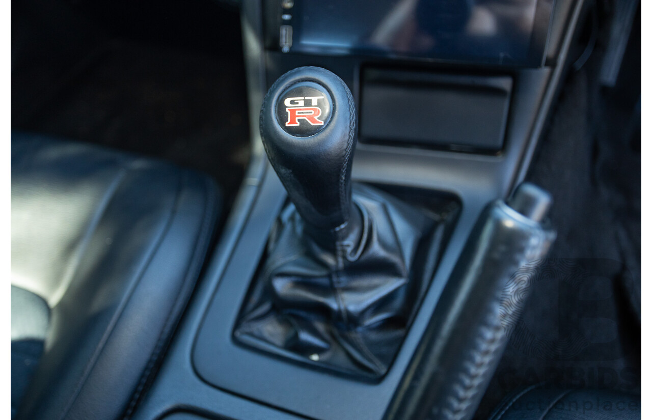 04/1997 Nissan Skyline R33 GT-R Series 3 BNR33 (AWD) 2d Coupe QM1 Polar White Turbo 2.6L - Modified 850hp+ - 05/2009 Import