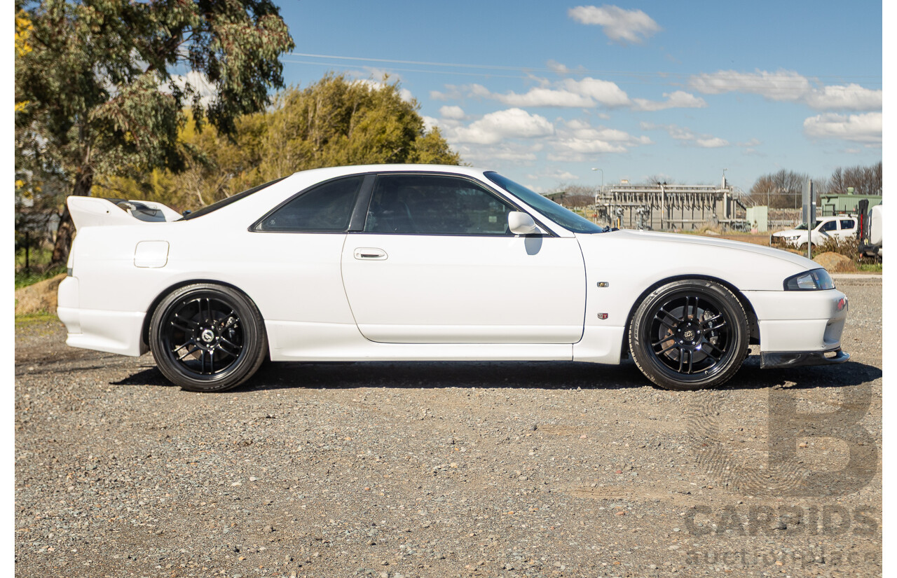 04/1997 Nissan Skyline R33 GT-R Series 3 BNR33 (AWD) 2d Coupe QM1 Polar White Turbo 2.6L - Modified 850hp+ - 05/2009 Import