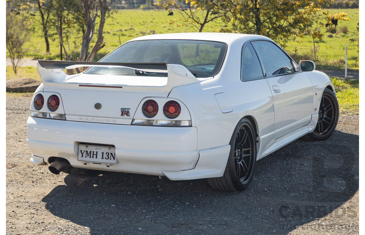 04/1997 Nissan Skyline R33 GT-R Series 3 BNR33 (AWD) 2d Coupe QM1 Polar White Turbo 2.6L - Modified 850hp+ - 05/2009 Import