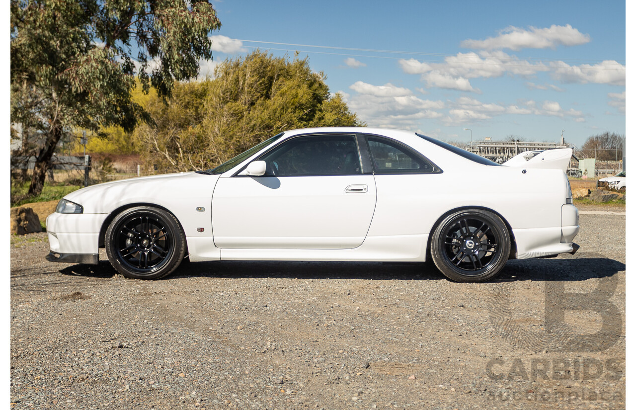 04/1997 Nissan Skyline R33 GT-R Series 3 BNR33 (AWD) 2d Coupe QM1 Polar White Turbo 2.6L - Modified 850hp+ - 05/2009 Import